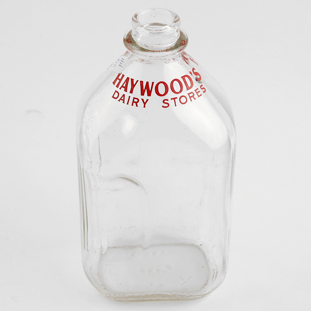 Six Half-Gallon Glass Milk Bottles