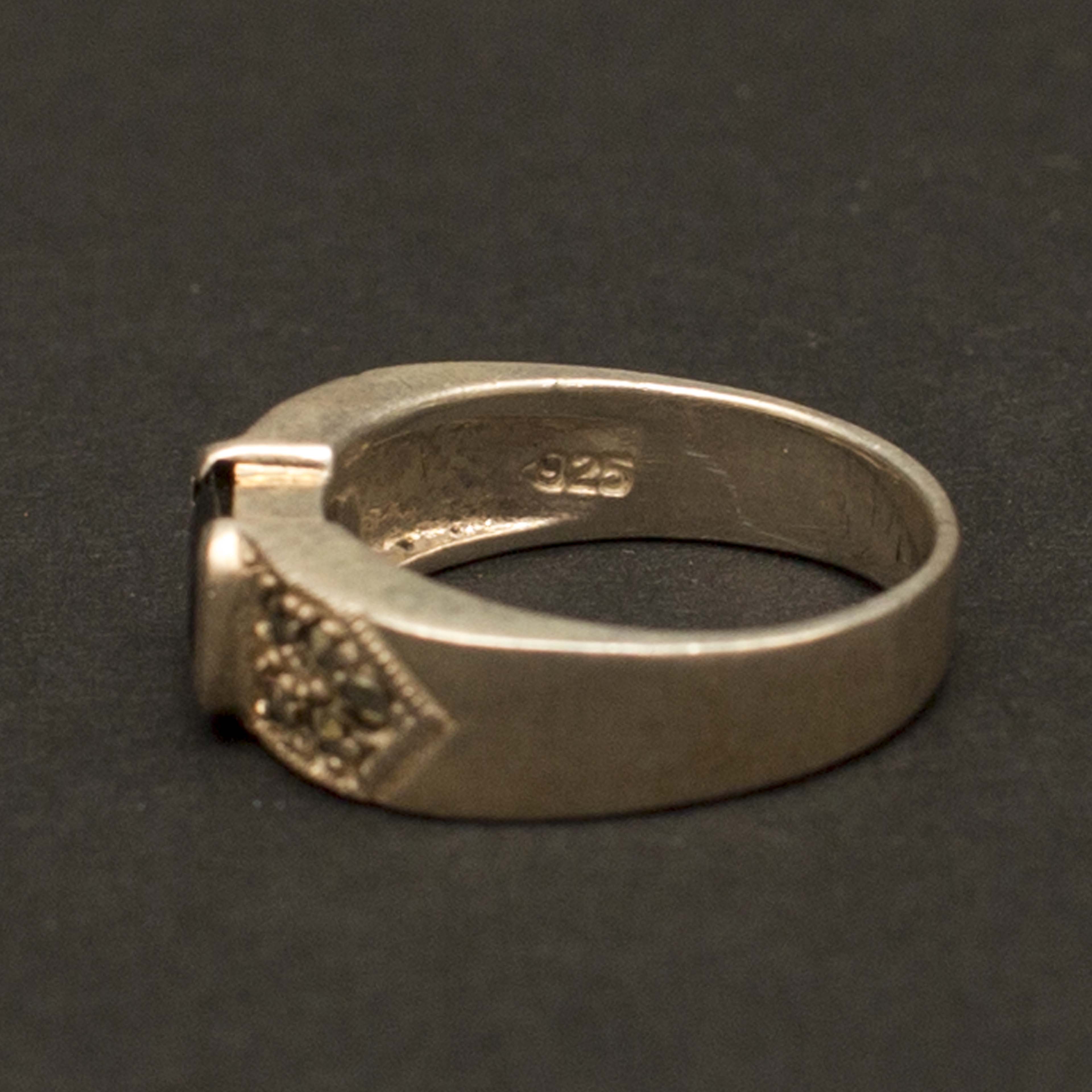 Sterling Silver Band with Emerald Cut Stone