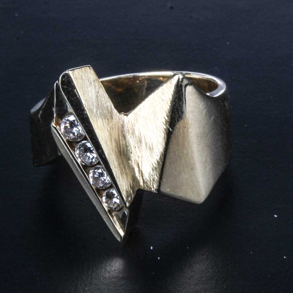 14K Gold and 0.25 CTW Diamond Ring