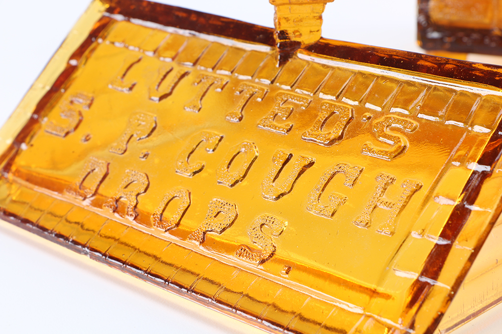 Lutted's S. P. Cough Drops Container