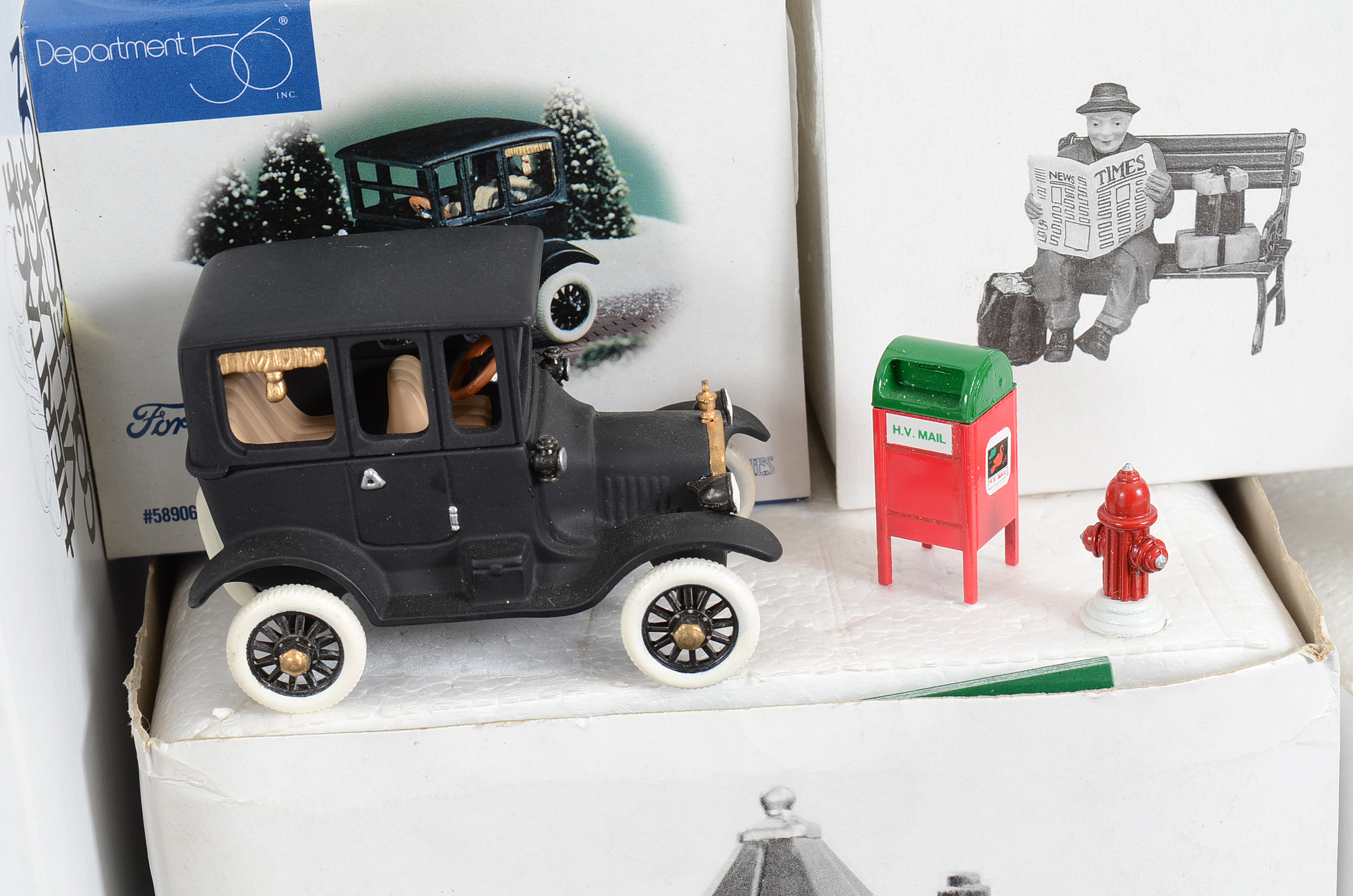 Collection of Four Retired Department 56 Christmas in the City Series Buildings with Accessories