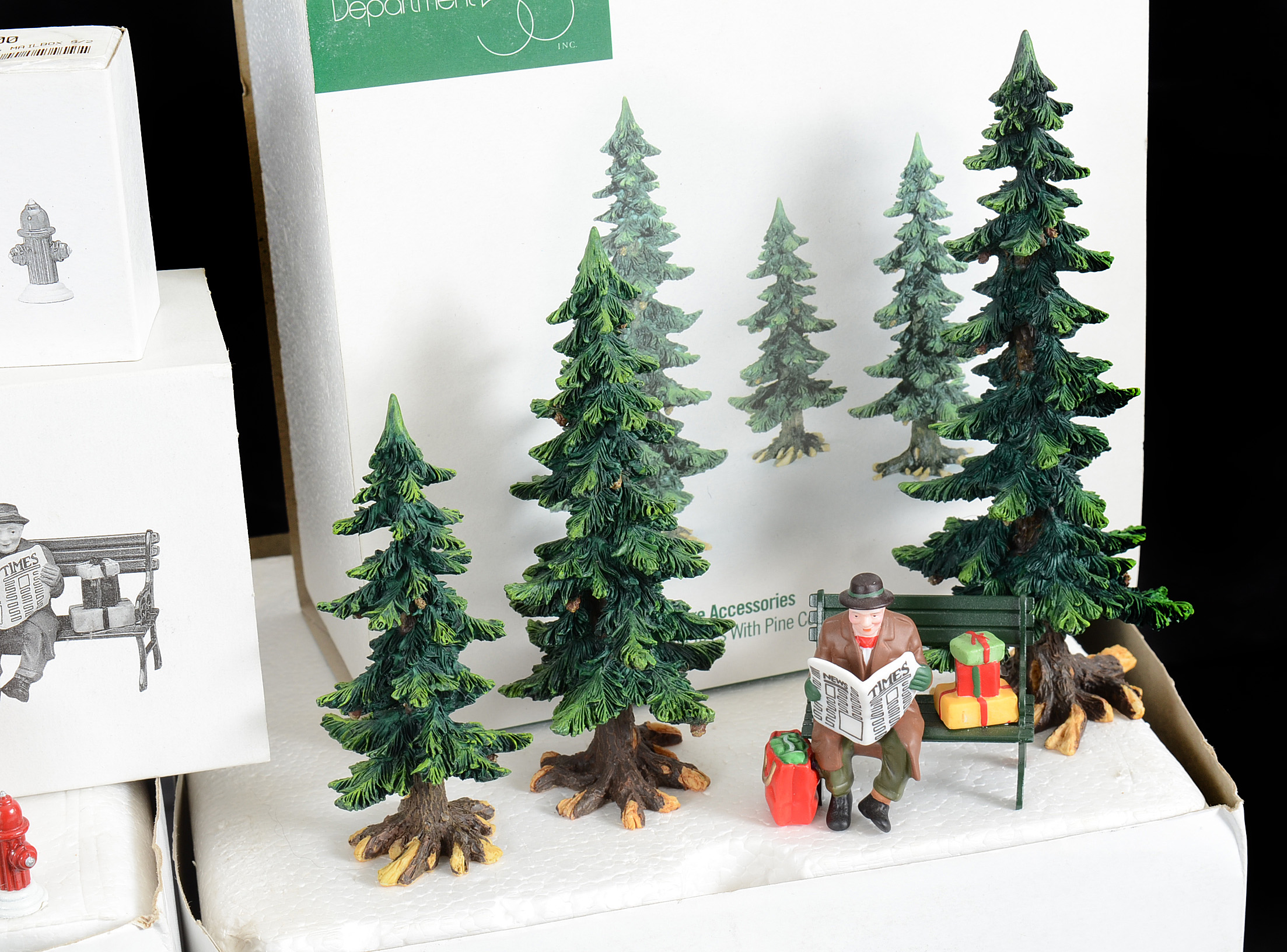 Collection of Four Retired Department 56 Christmas in the City Series Buildings with Accessories