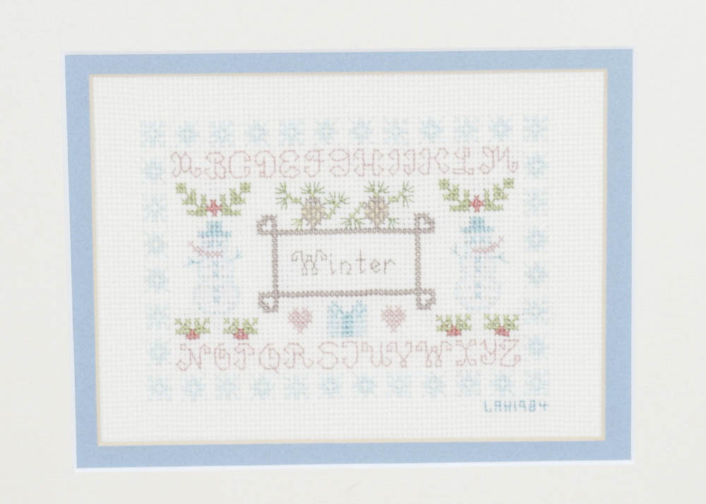 Hand-Stitched Seasons Cross Stitch