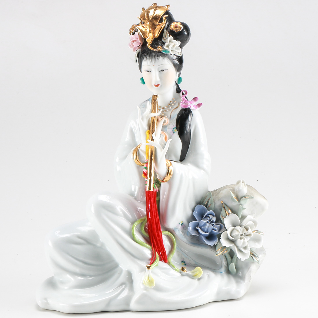 Porcelain Chinese Beauty Playing the Flute