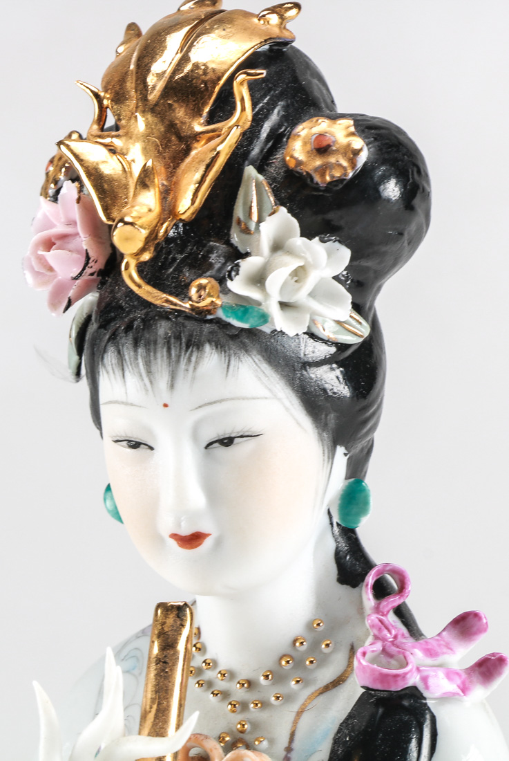 Porcelain Chinese Beauty Playing the Flute