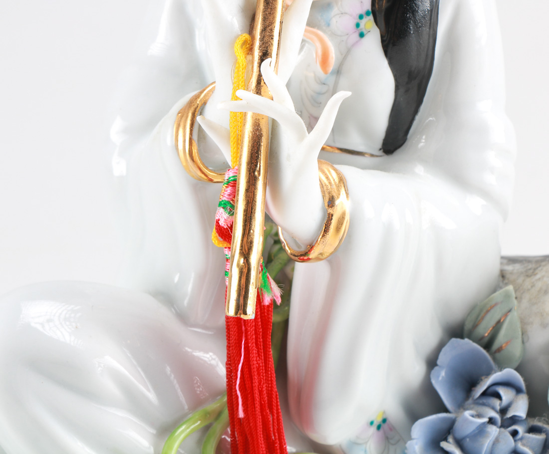 Porcelain Chinese Beauty Playing the Flute