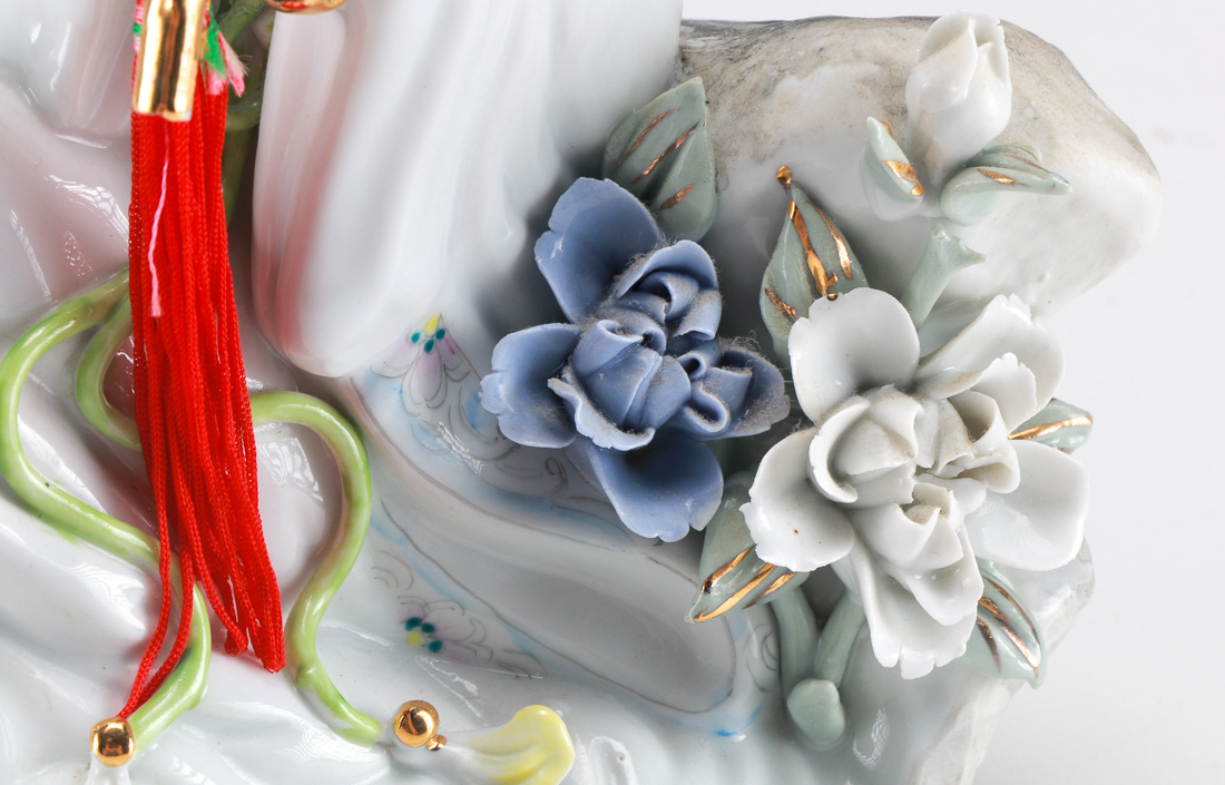 Porcelain Chinese Beauty Playing the Flute