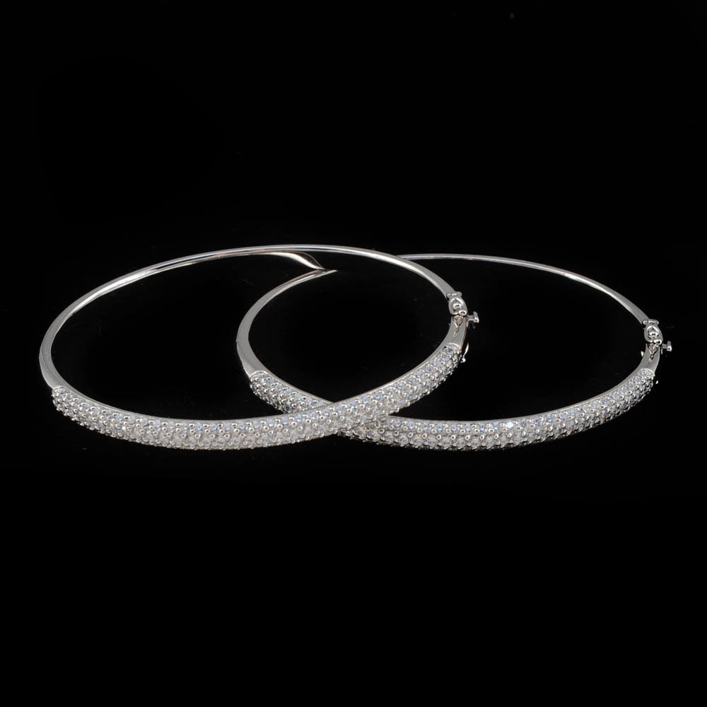Two Sterling Silver and Cubic Zirconium Hinged Bangles