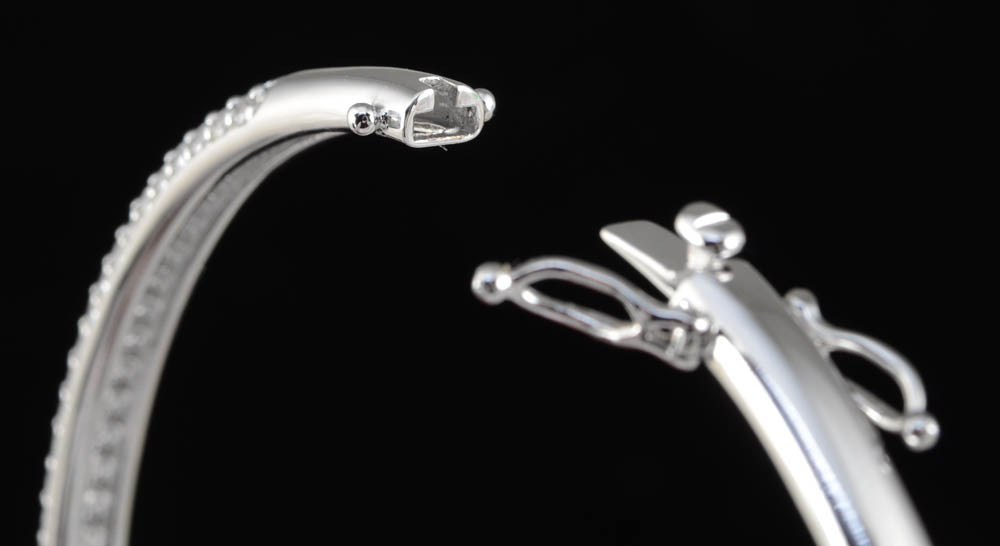 Two Sterling Silver and Cubic Zirconium Hinged Bangles