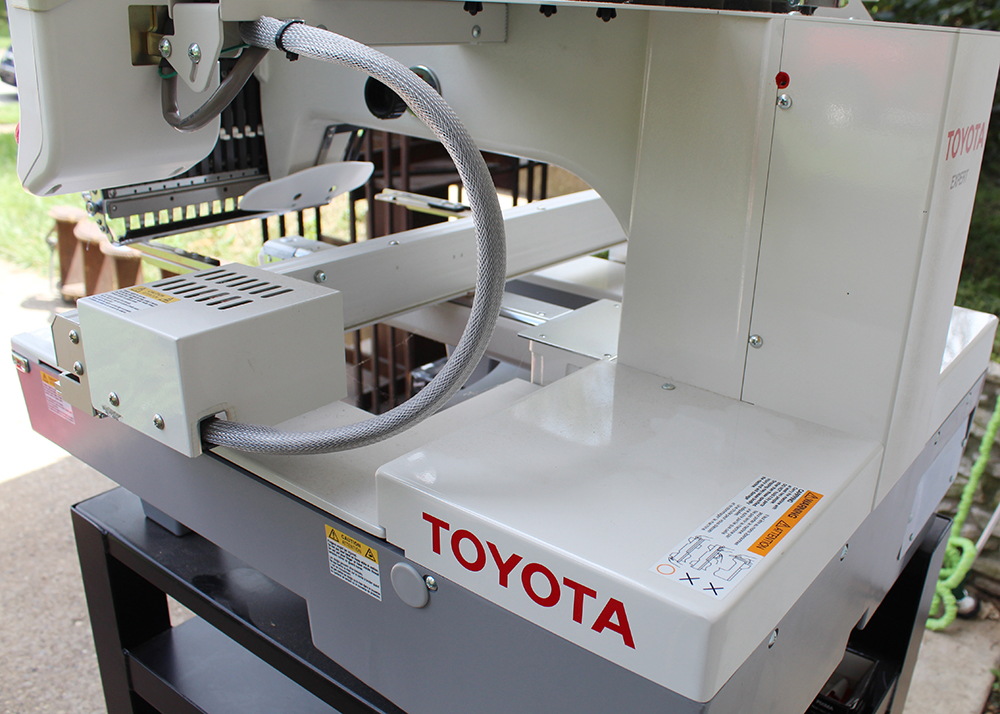 Toyota Expert ESP9100 Net Embroidery Machine with Cart and Attachments