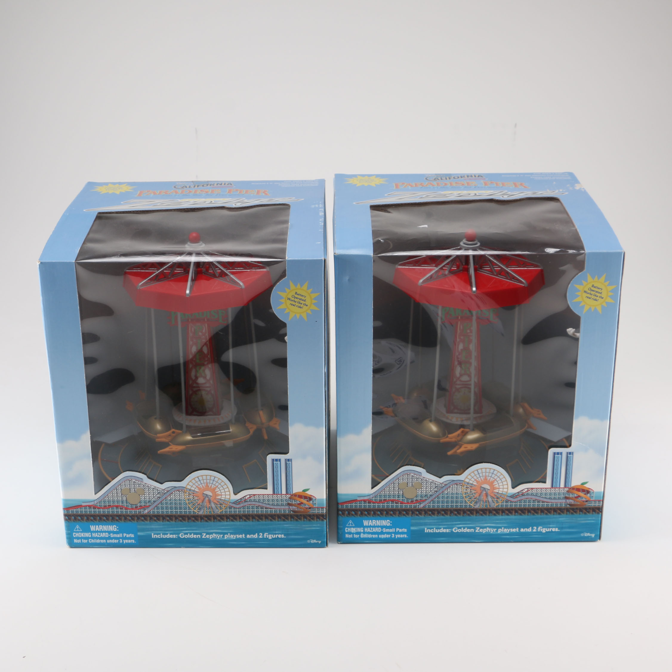 Pair of Disney Paradise Pier Golden Zephyr Toys