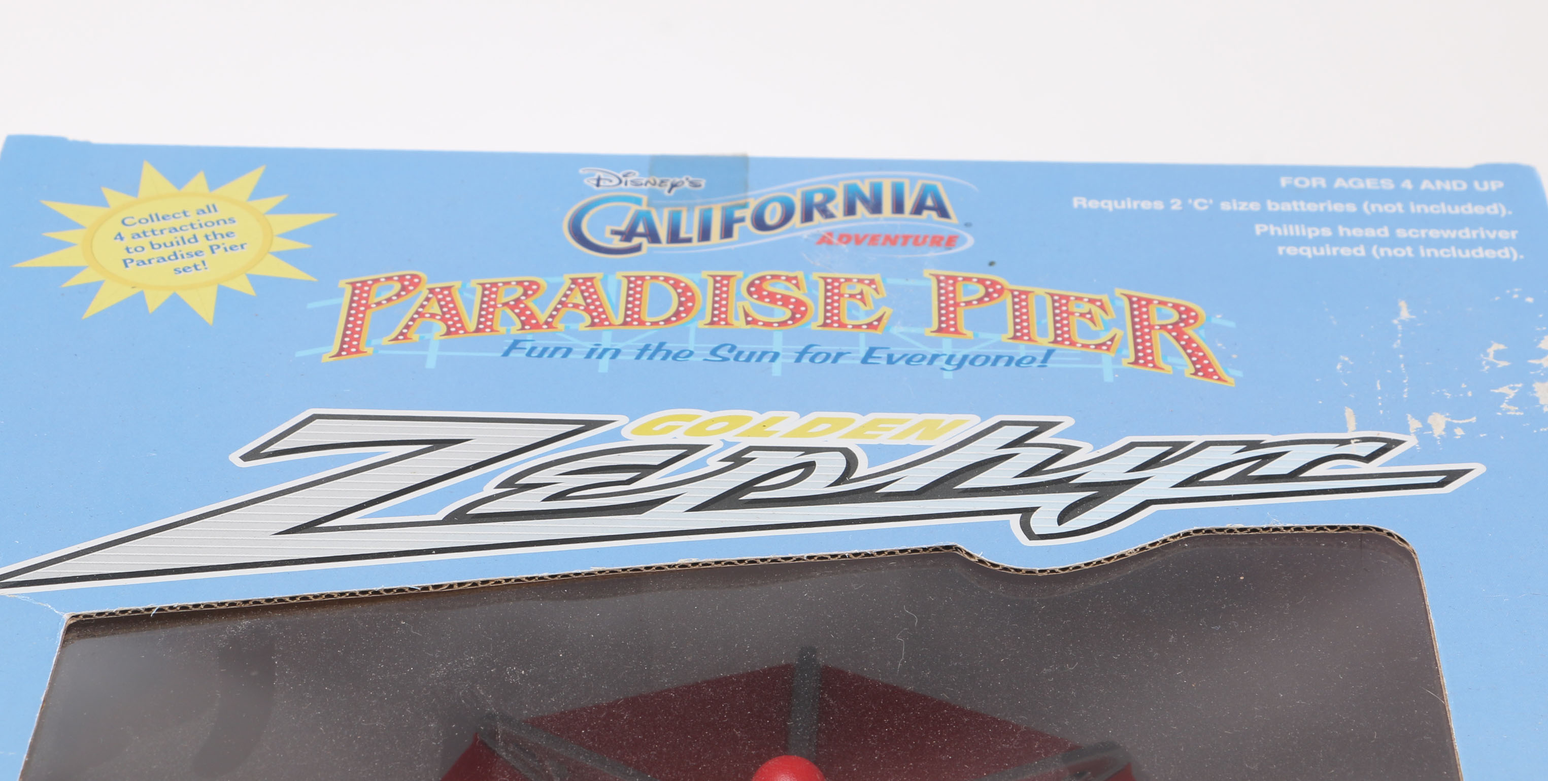 Pair of Disney Paradise Pier Golden Zephyr Toys