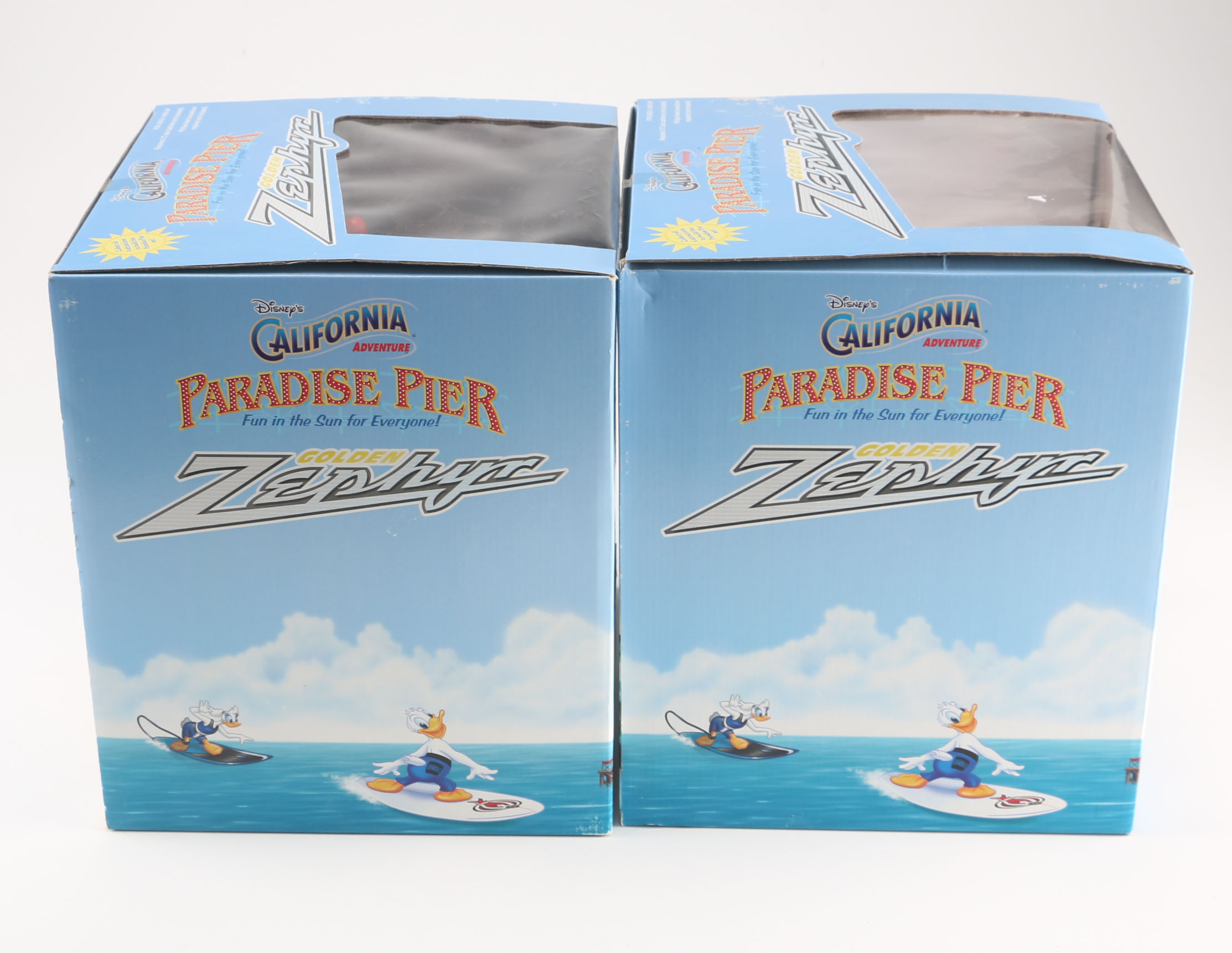 Pair of Disney Paradise Pier Golden Zephyr Toys