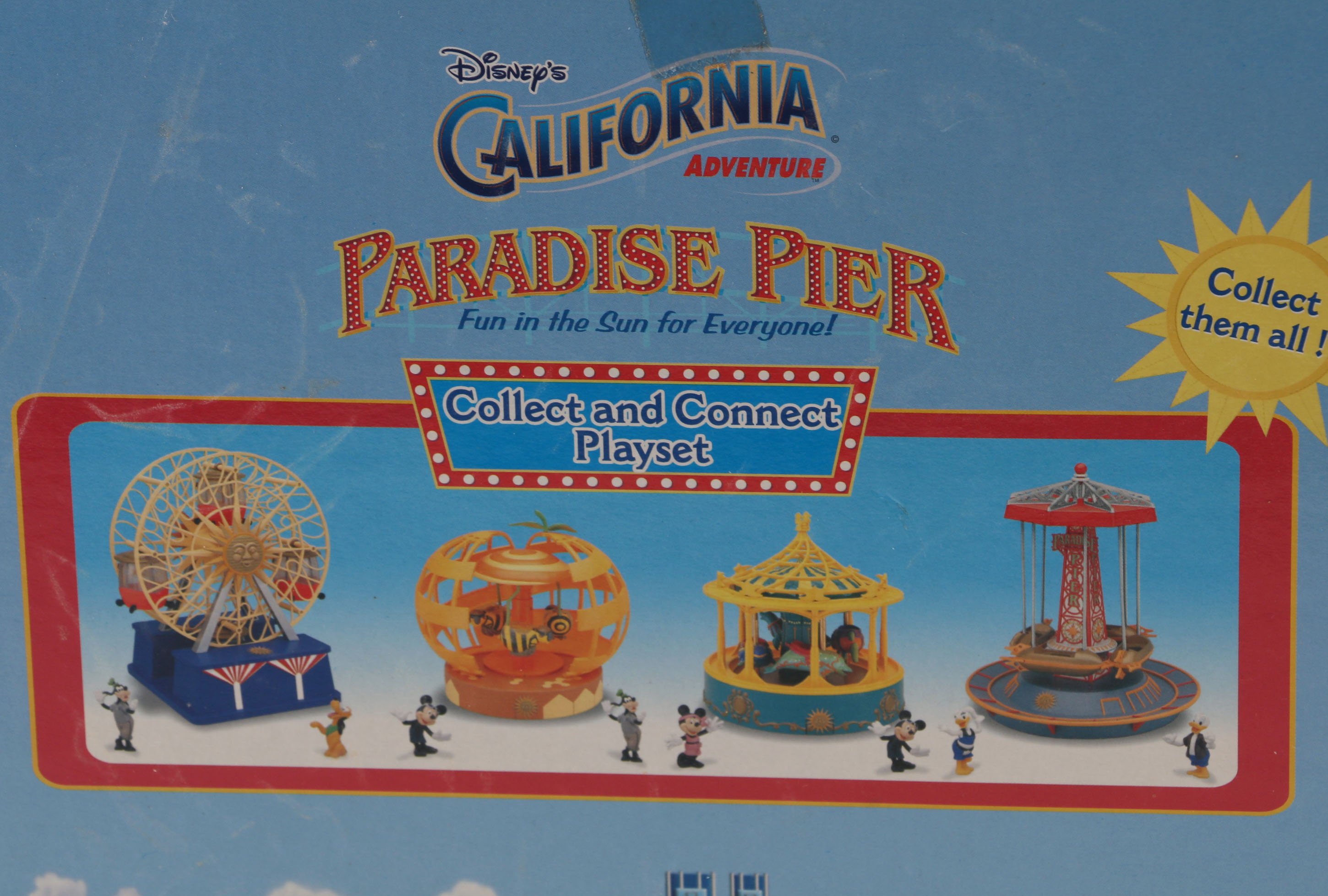 Pair of Disney Paradise Pier Golden Zephyr Toys