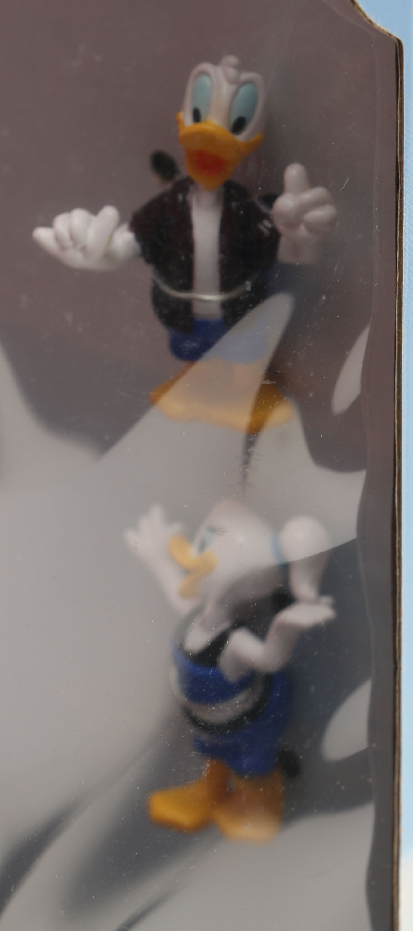 Pair of Disney Paradise Pier Golden Zephyr Toys