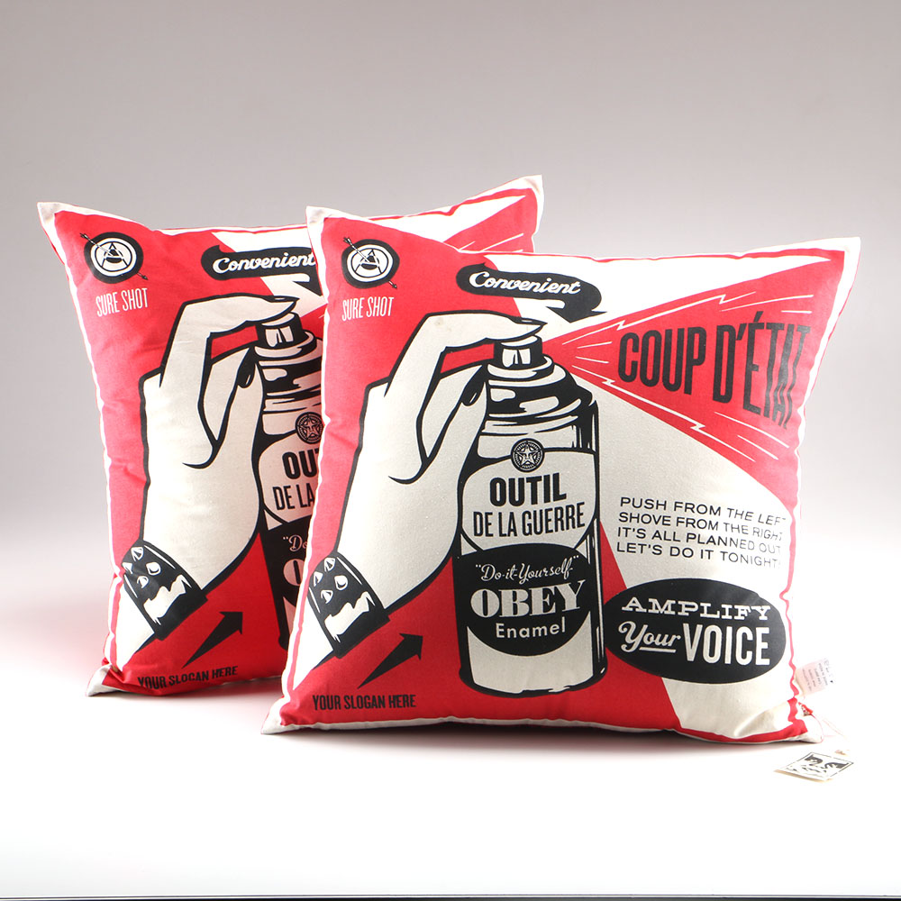 Pair Of Shepard Fairey Pillows