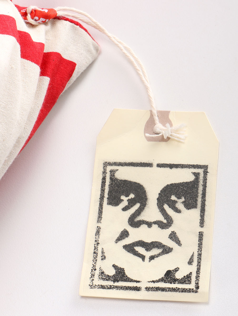 Pair Of Shepard Fairey Pillows