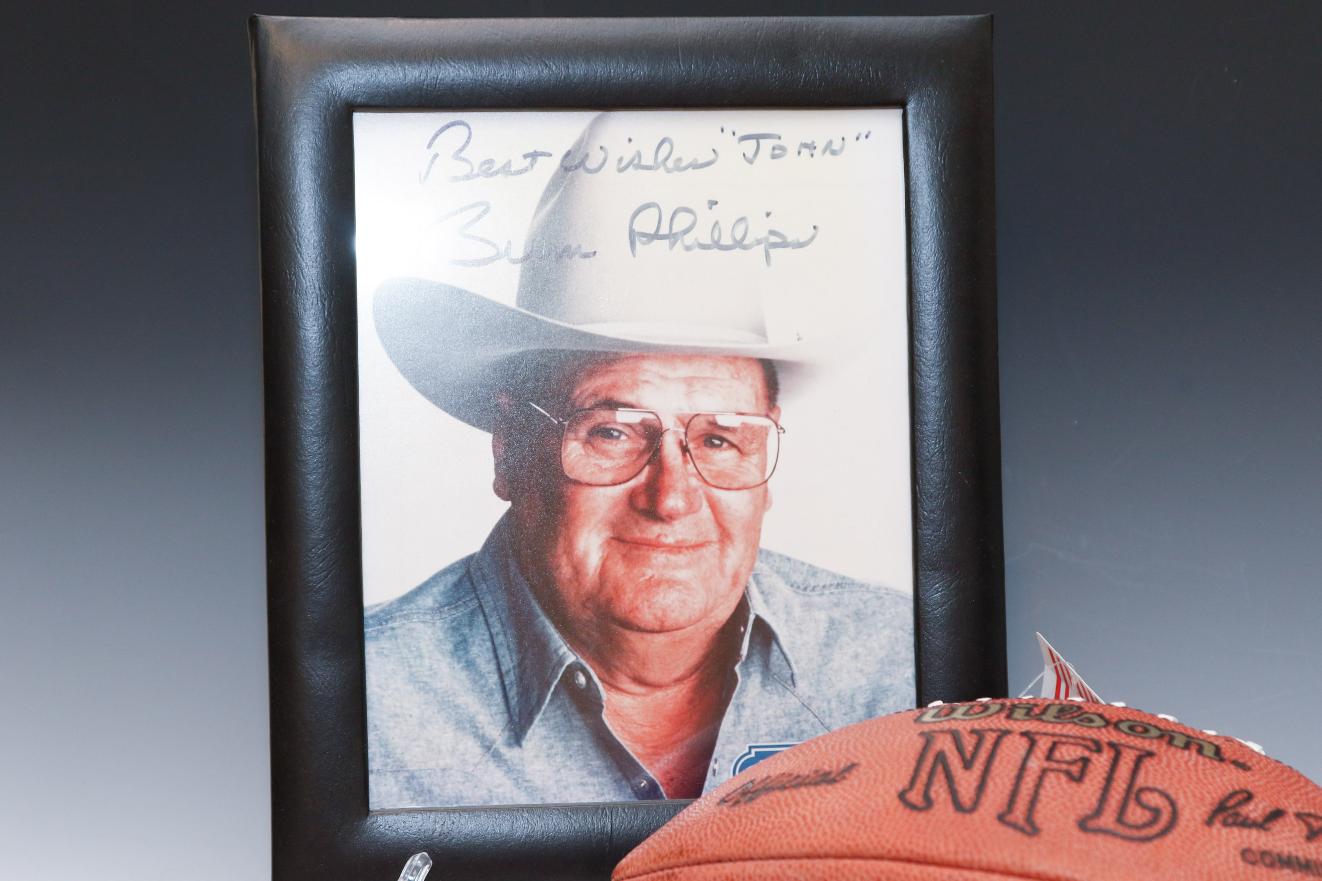Autographed Warren Moon Football and Bum Phillips Framed Photo