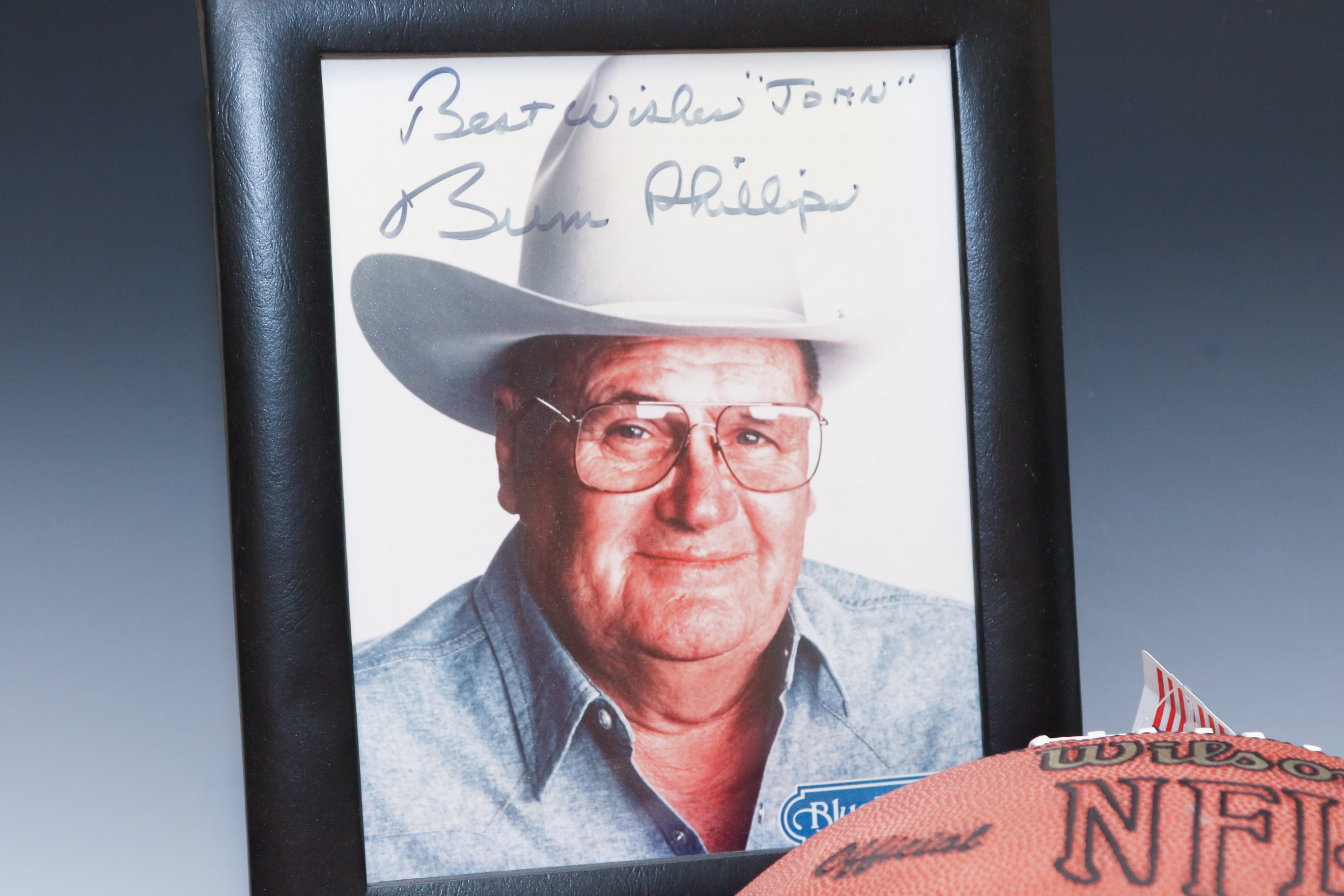 Autographed Warren Moon Football and Bum Phillips Framed Photo