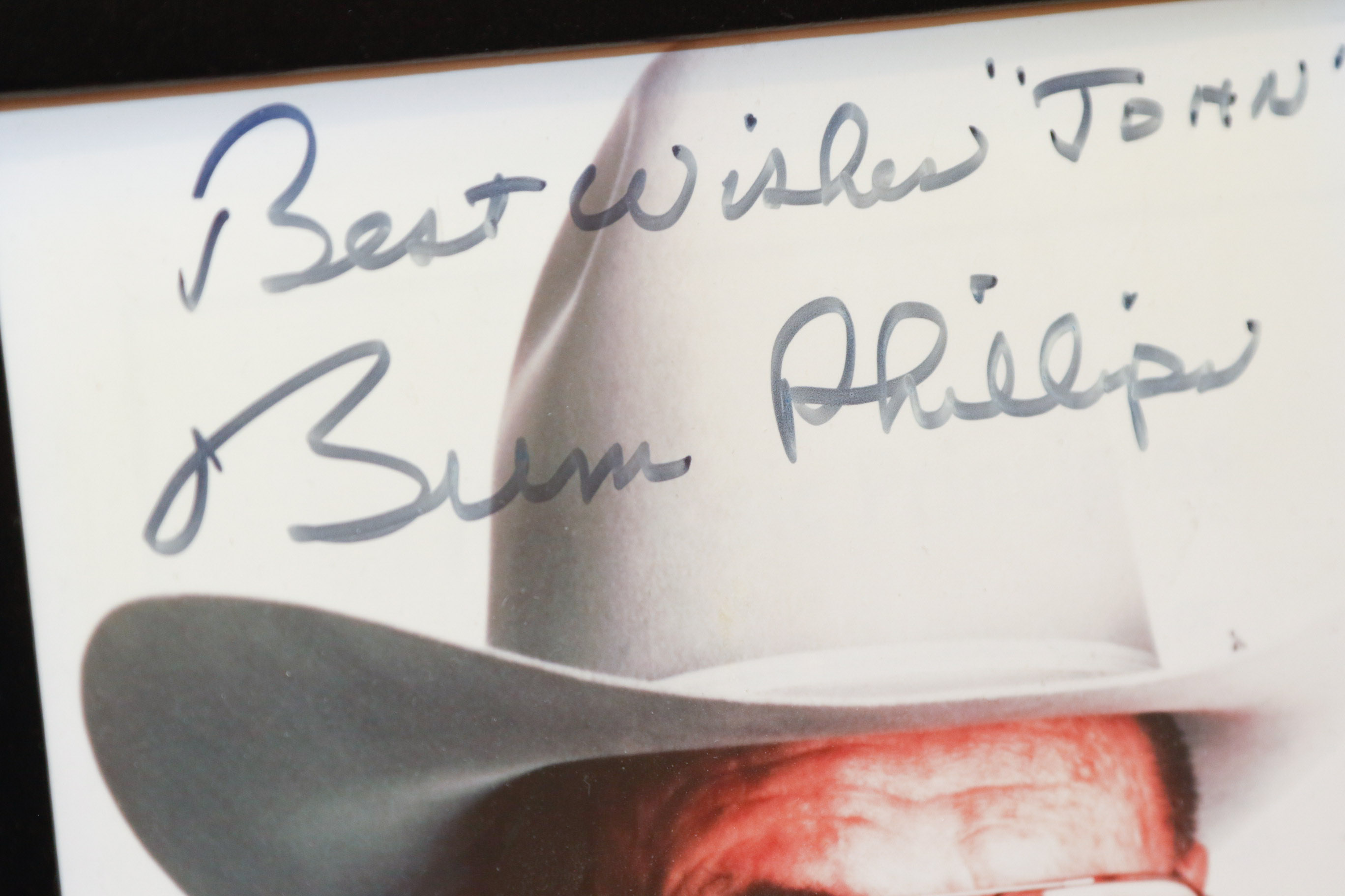 Autographed Warren Moon Football and Bum Phillips Framed Photo