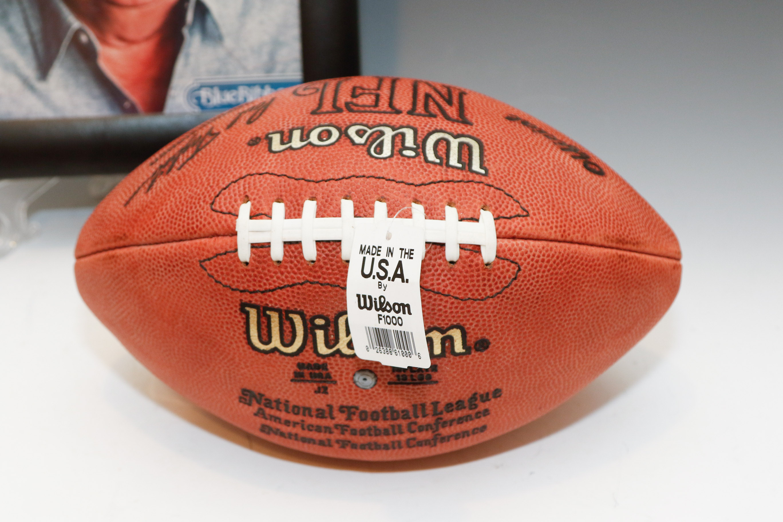 Autographed Warren Moon Football and Bum Phillips Framed Photo