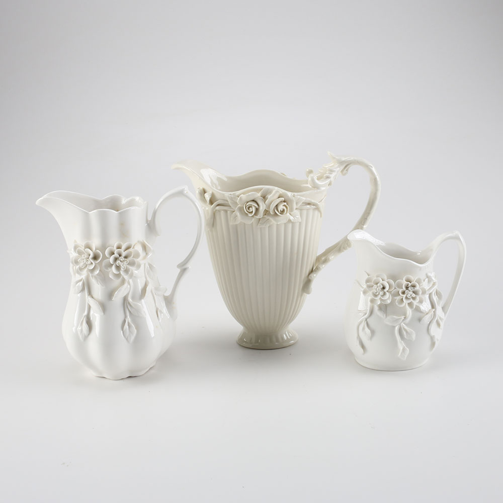 Set of Three Decorative Porcelain Pitchers