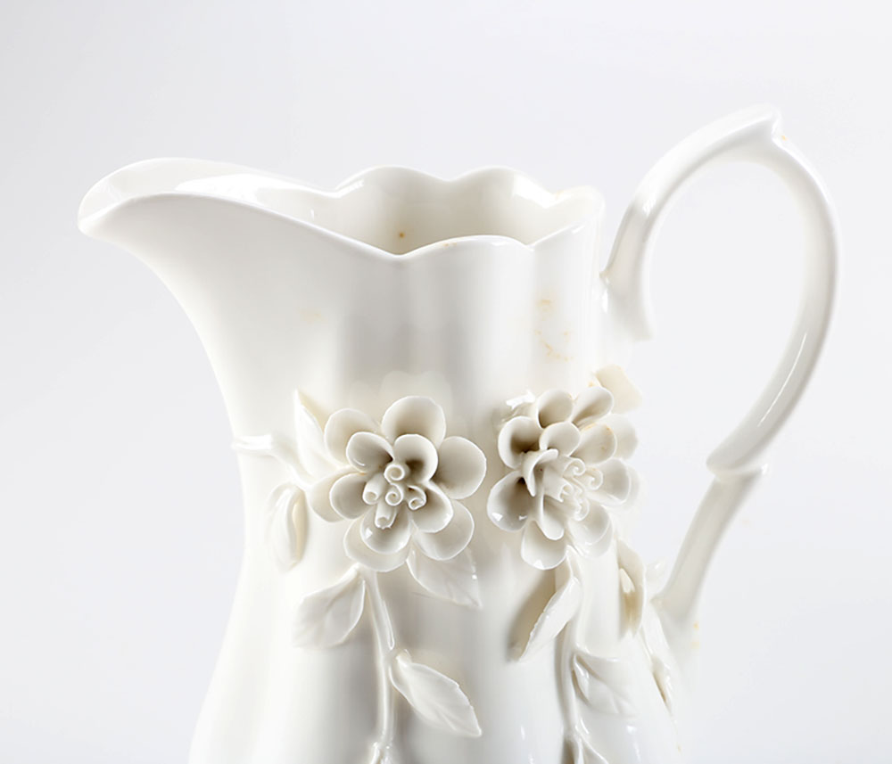 Set of Three Decorative Porcelain Pitchers