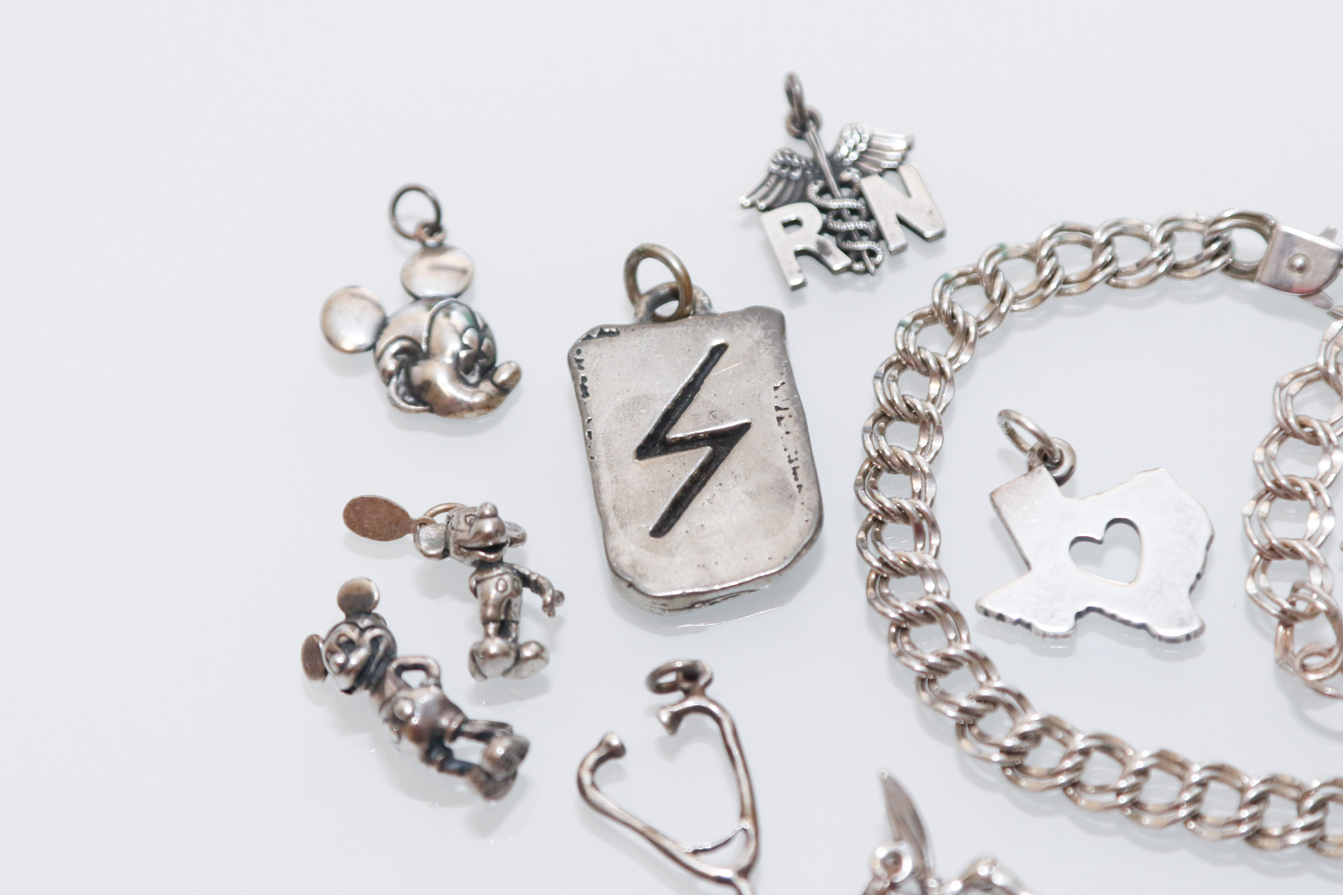 Two Sterling Silver Charm Bracelets with Collection of 925 Stamped Charms