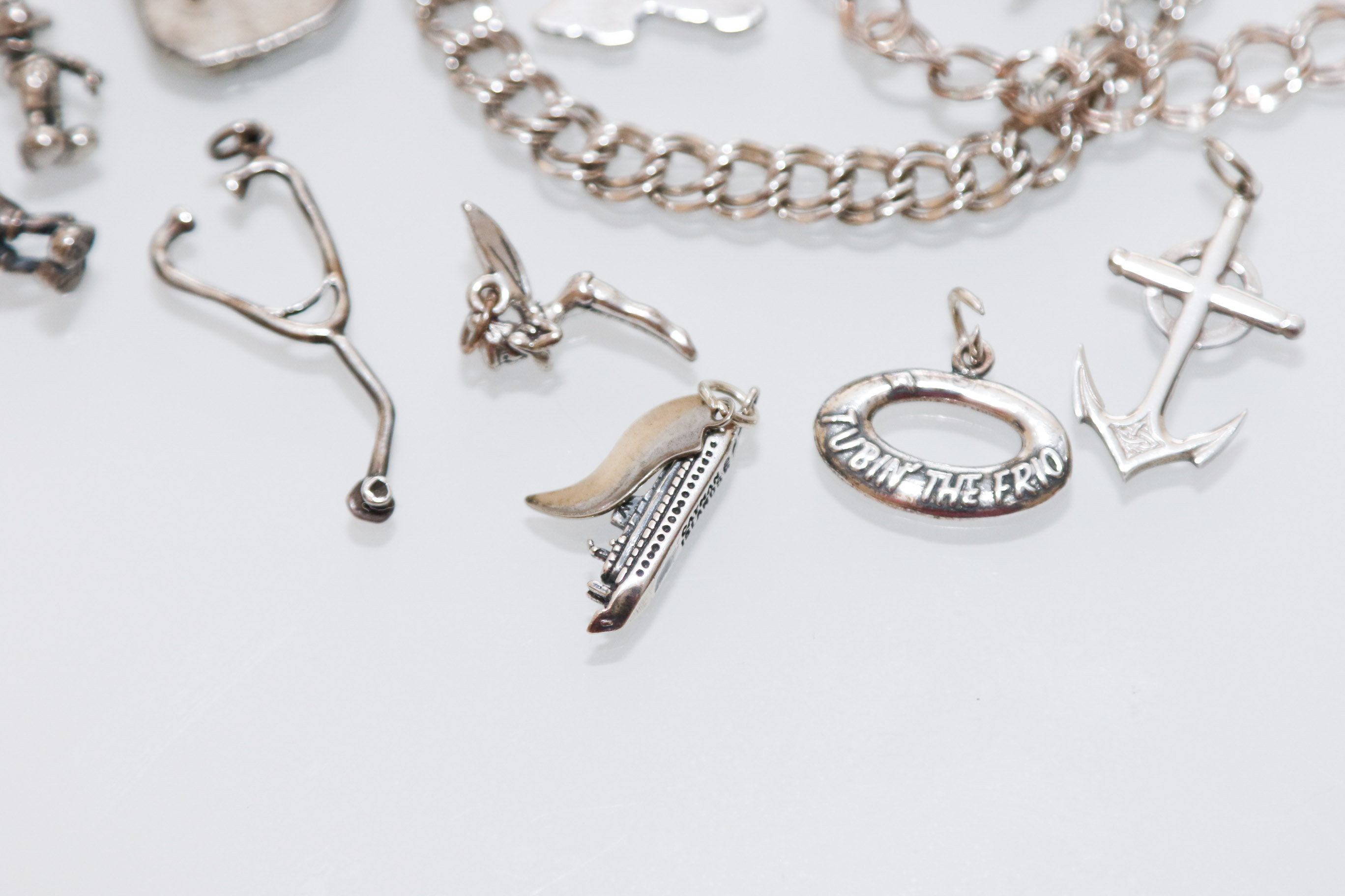 Two Sterling Silver Charm Bracelets with Collection of 925 Stamped Charms