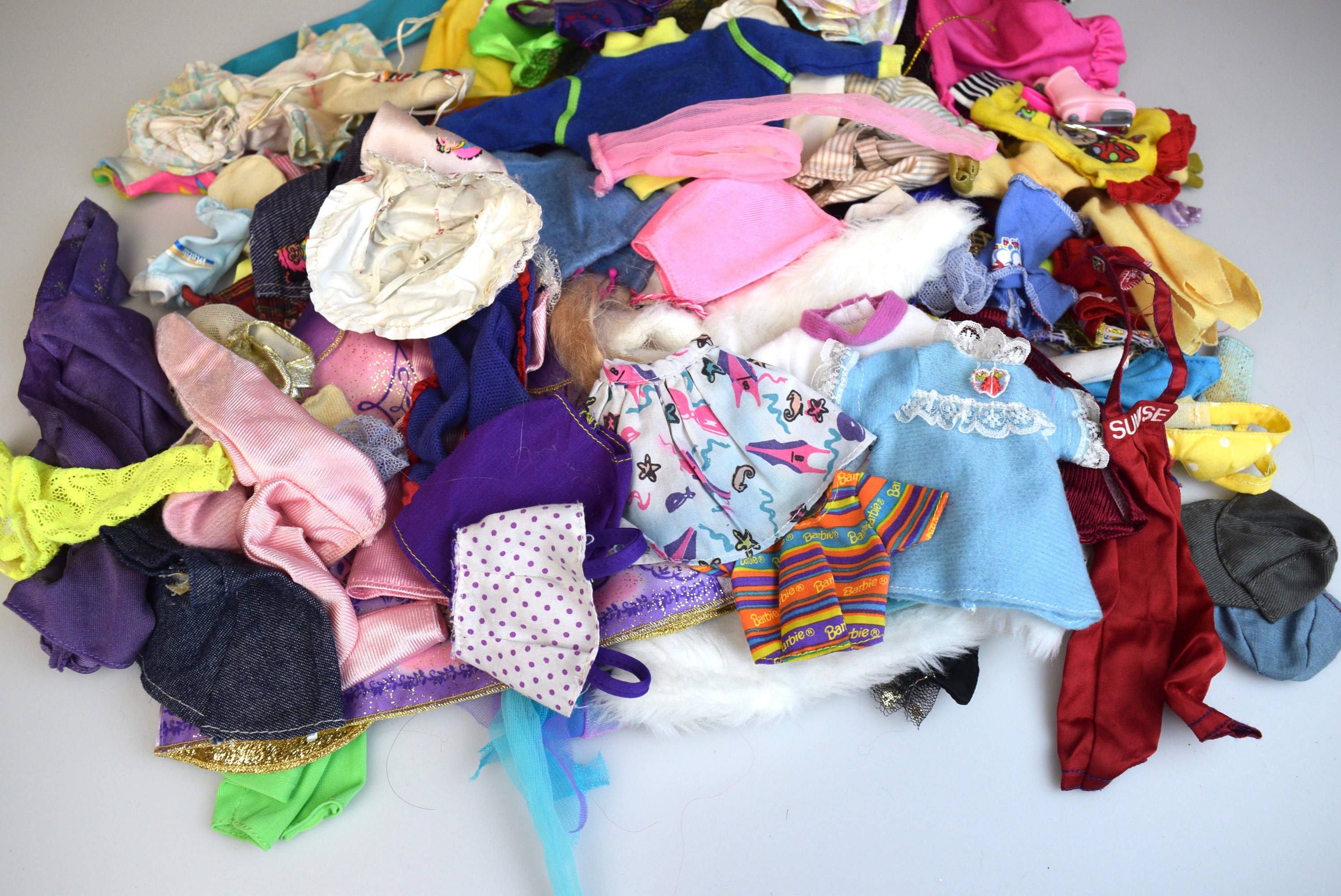 Collection of Vintage Barbie Clothing