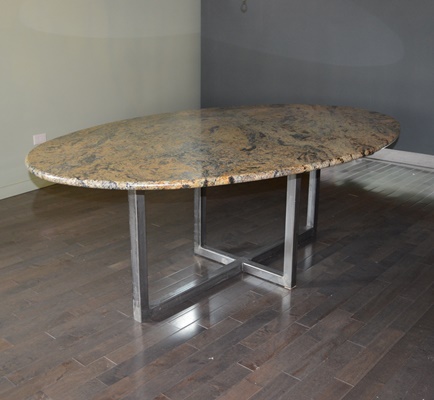 Oval Granite Top Dining Table and Six Beige Chairs