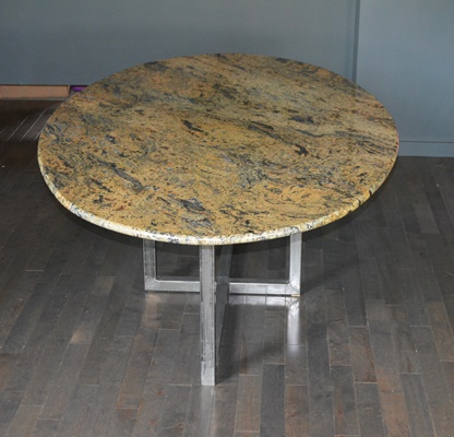 Oval Granite Top Dining Table and Six Beige Chairs