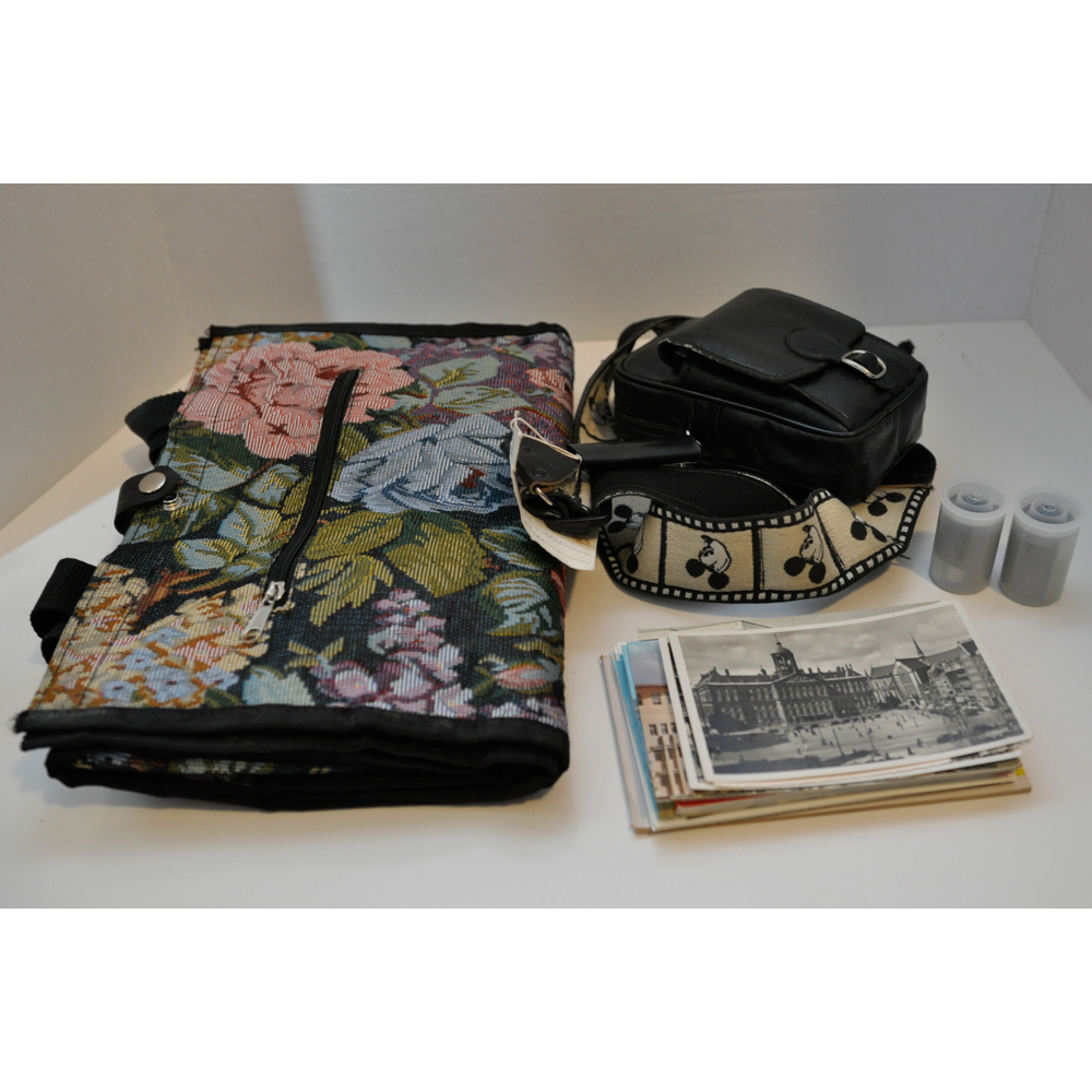 Vintage Travel Items Including Postcards of India and Disney Camera Strap