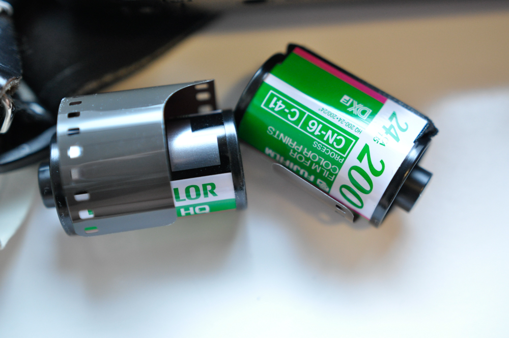 Vintage Travel Items Including Postcards of India and Disney Camera Strap