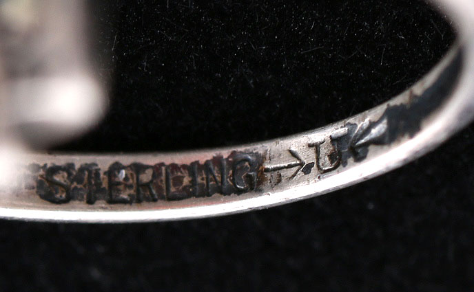 Assorment of Stamped Sterling Silver Rings with Various Stones