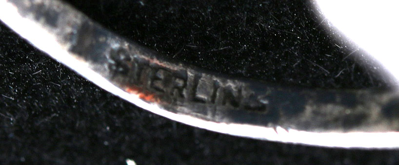 Assorment of Stamped Sterling Silver Rings with Various Stones