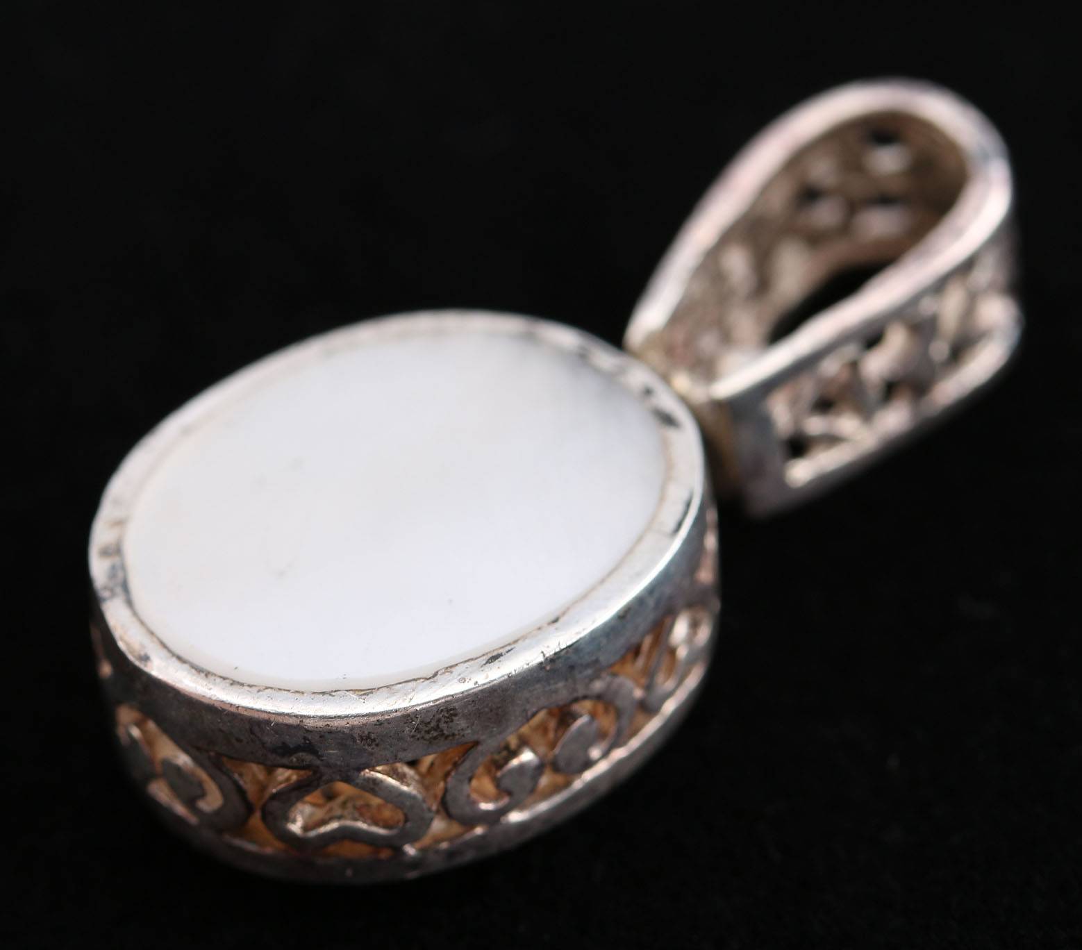 Three Sterling Silver Pendants