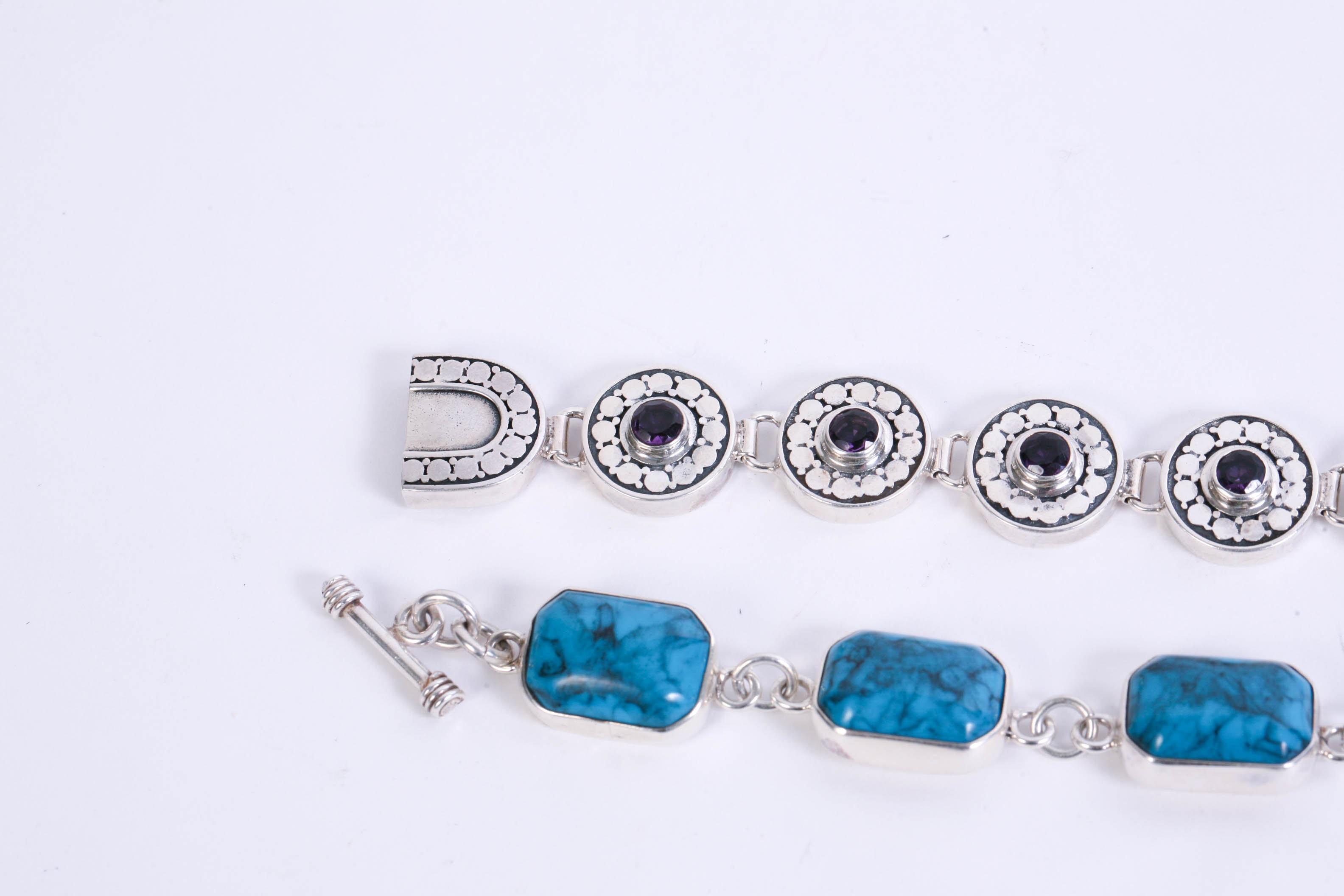 Two Sterling Silver Bracelets with Various Stones