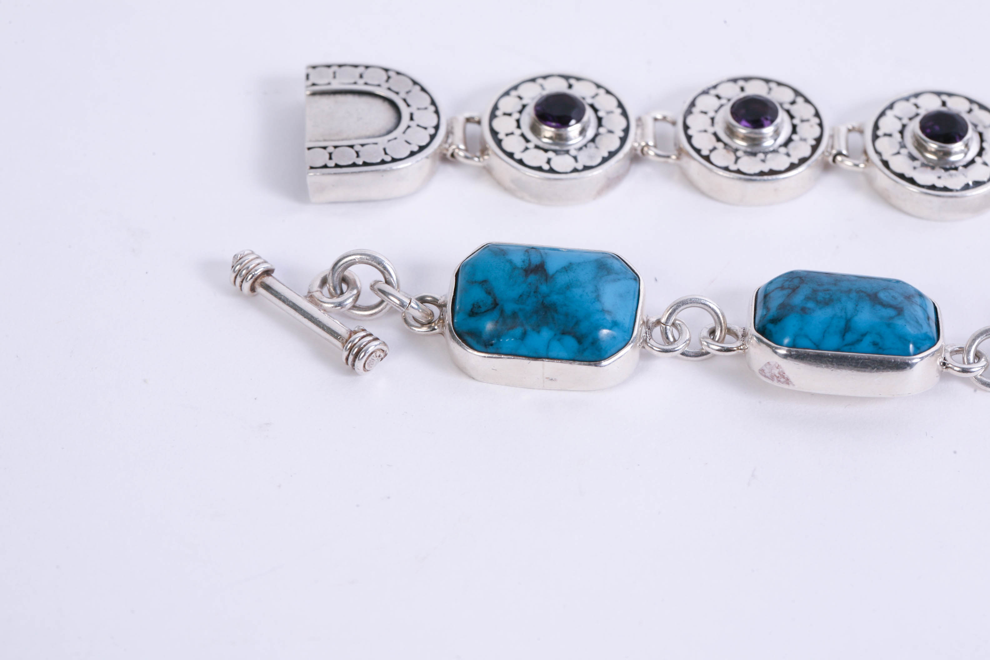 Two Sterling Silver Bracelets with Various Stones