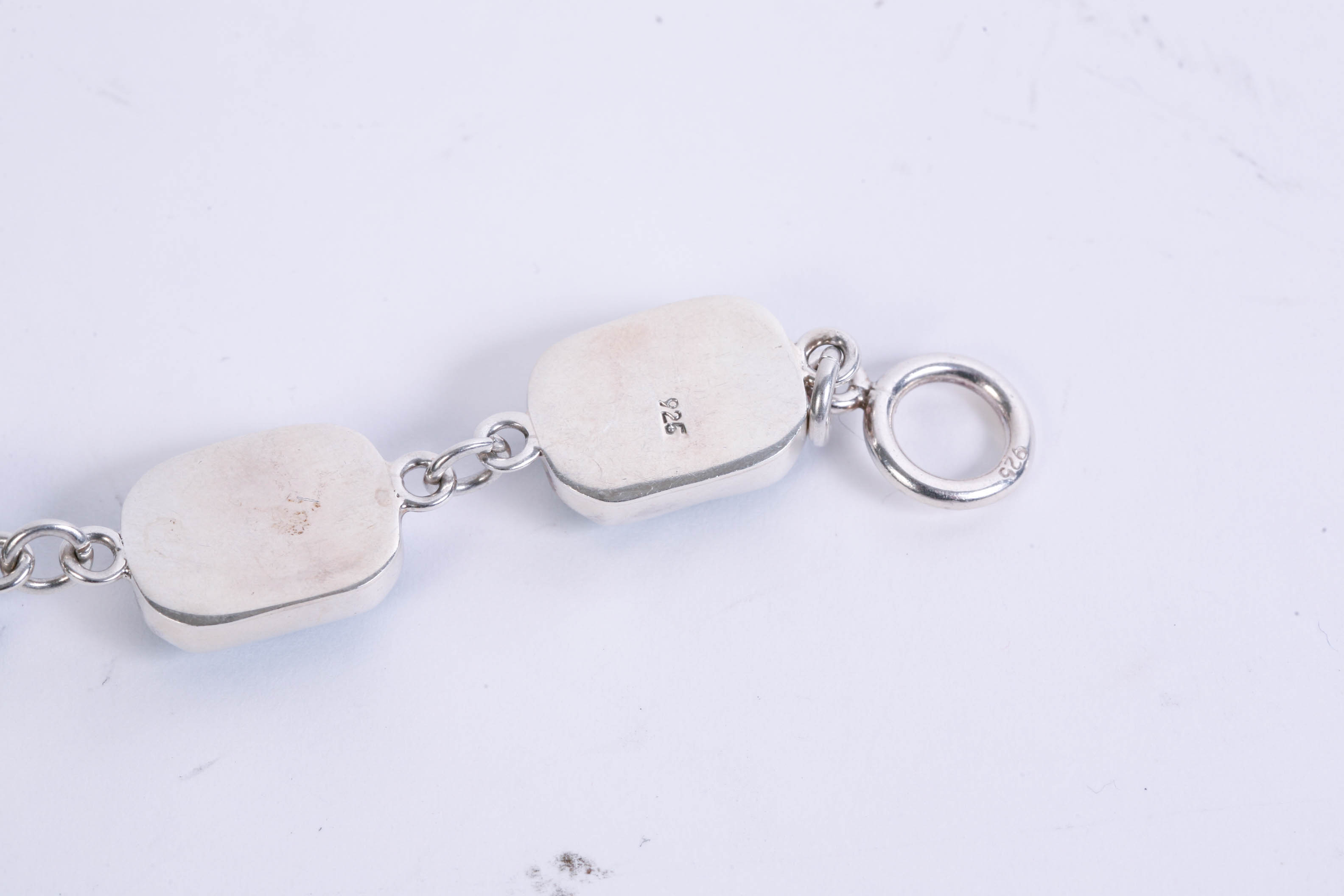 Two Sterling Silver Bracelets with Various Stones