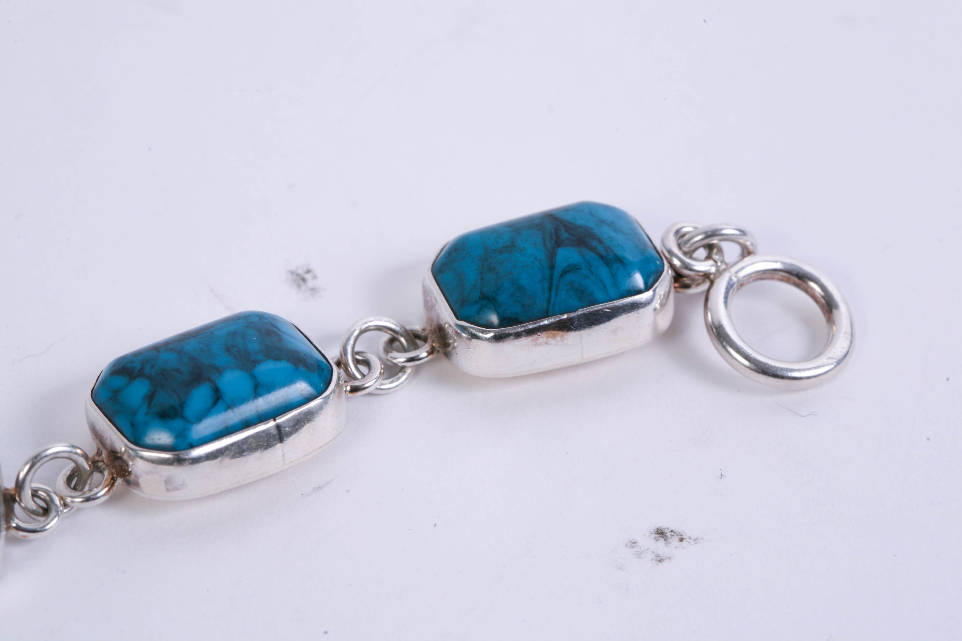 Two Sterling Silver Bracelets with Various Stones