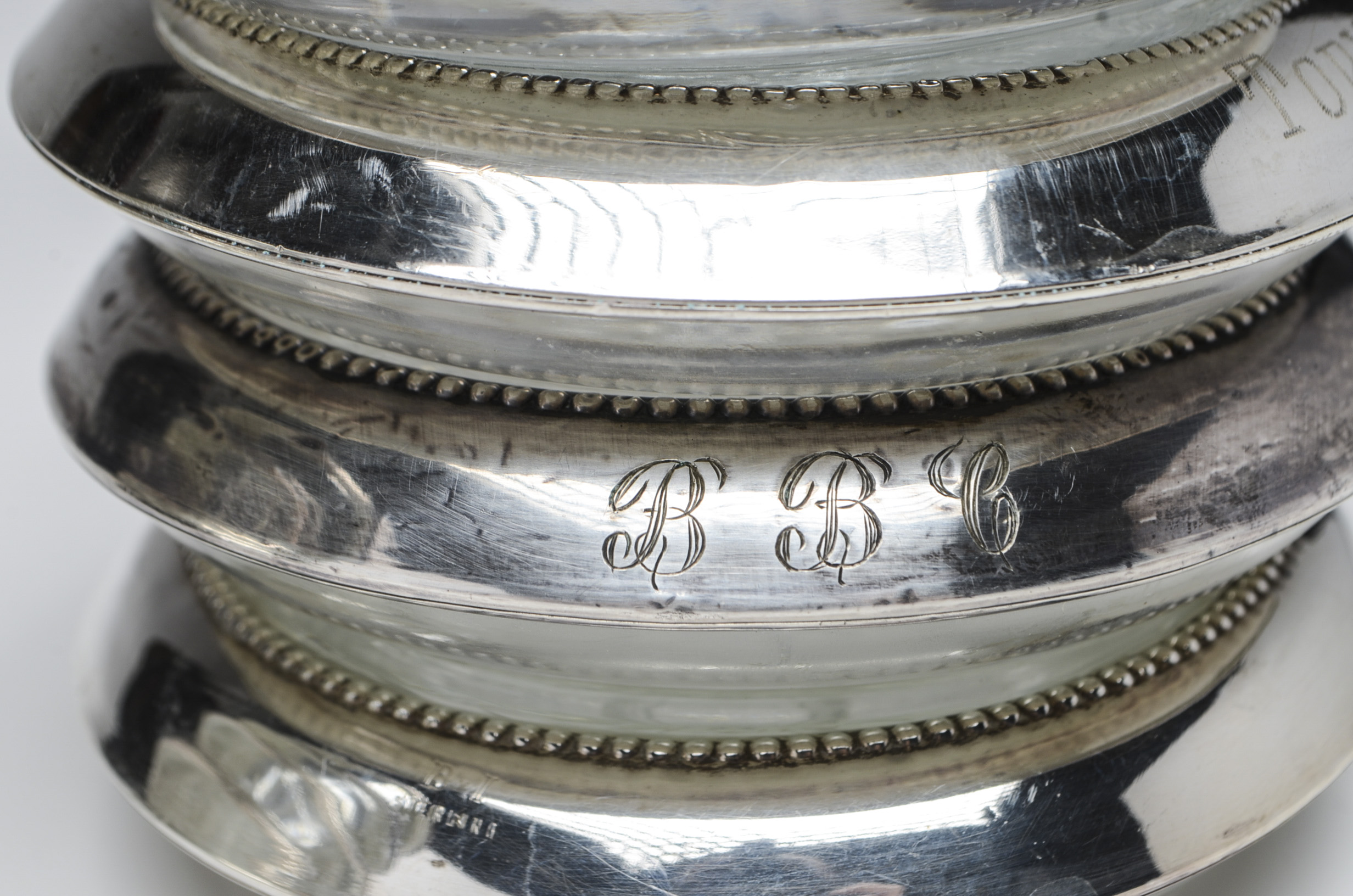 Ten Pressed Glass Coasters with Sterling Silver Rim