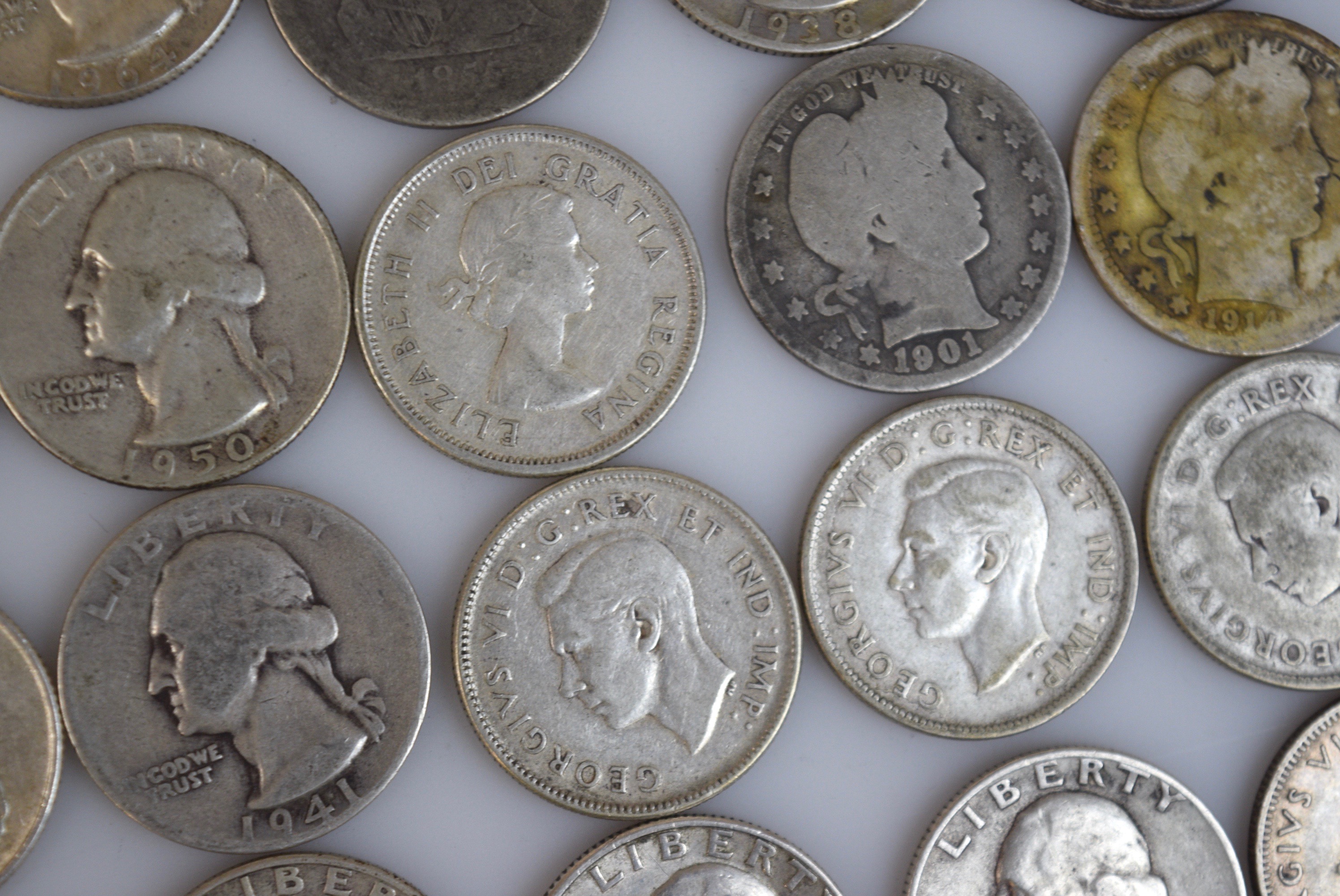 Washington, Barber, Seated Liberty, and Canadian Silver Quarters