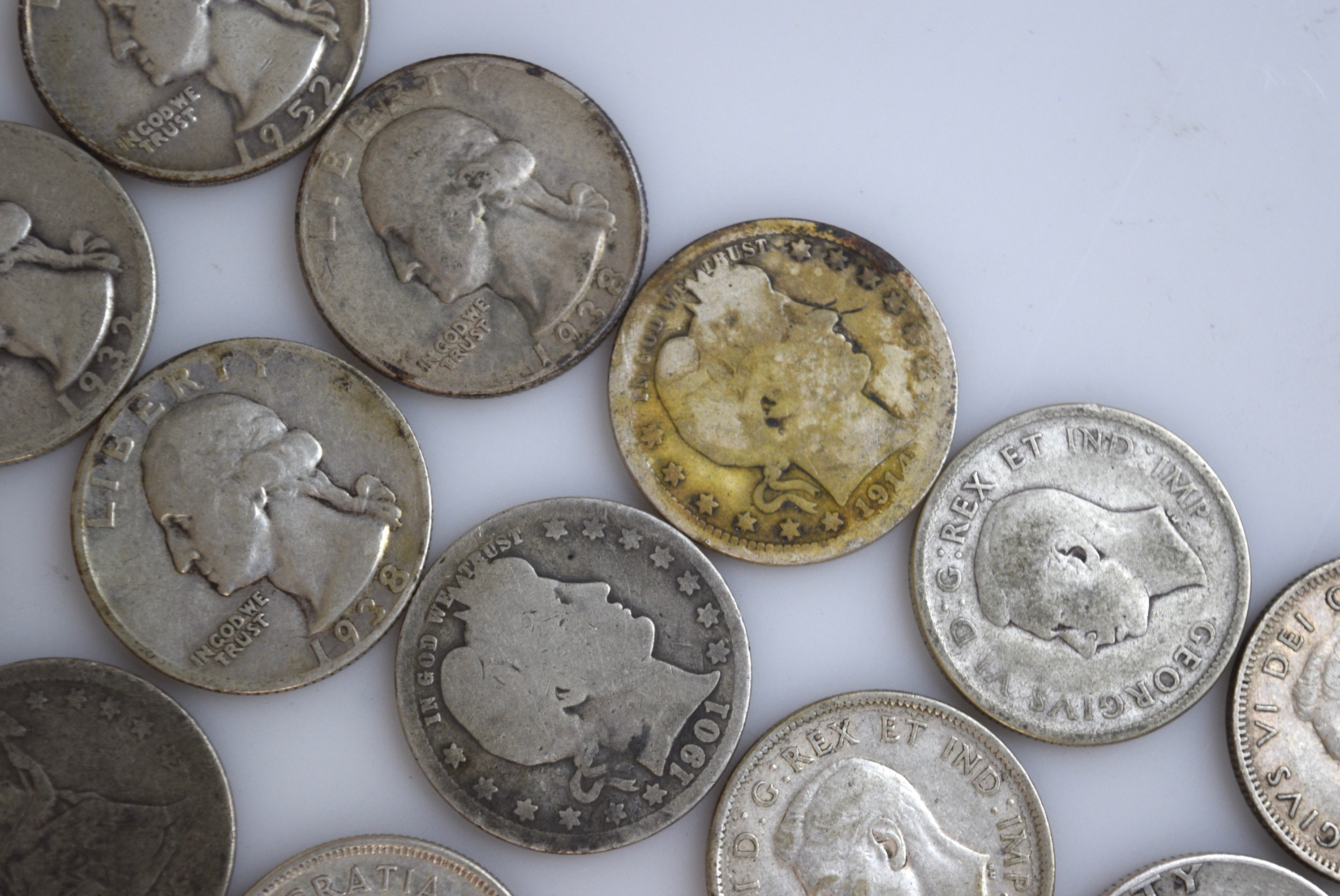 Washington, Barber, Seated Liberty, and Canadian Silver Quarters
