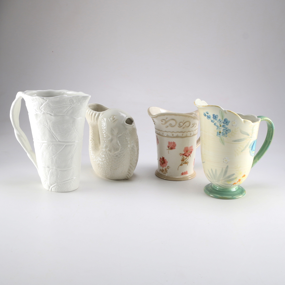 Four Ceramic Pitchers