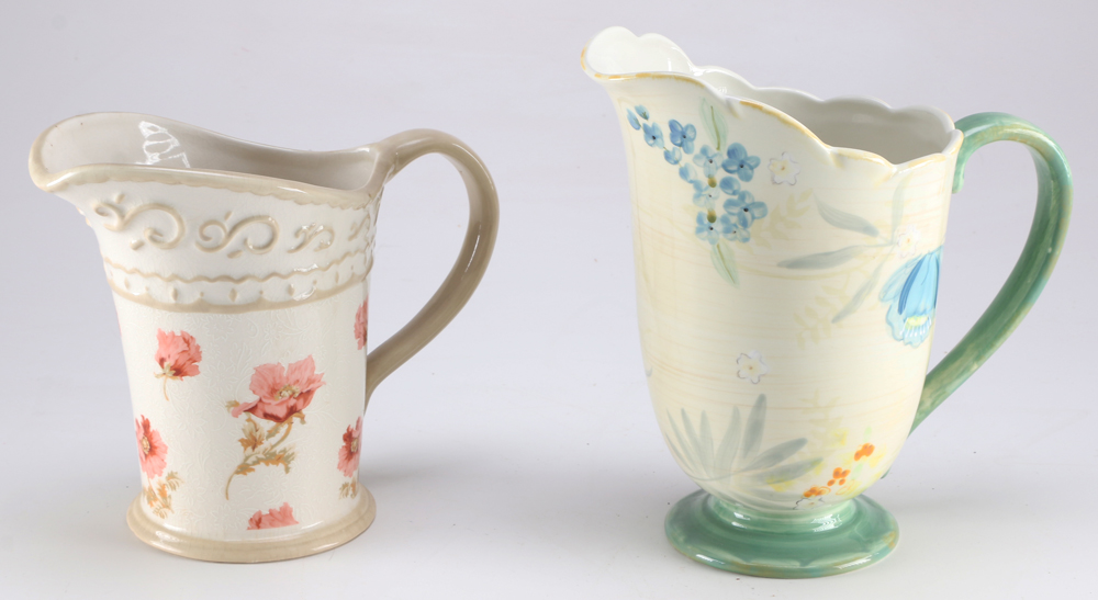 Four Ceramic Pitchers