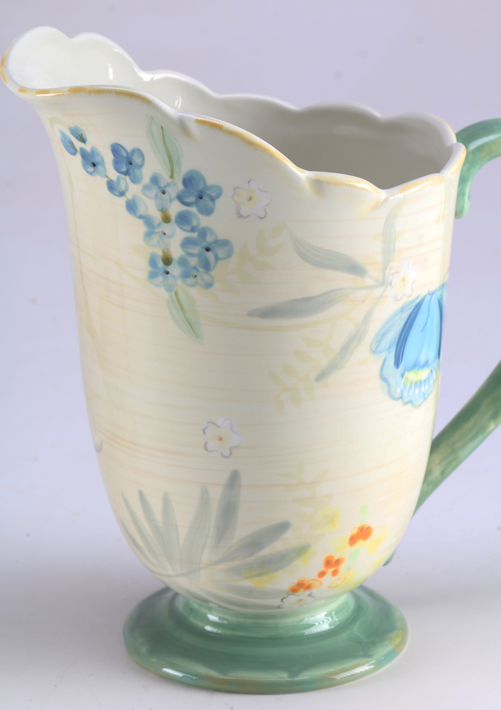 Four Ceramic Pitchers