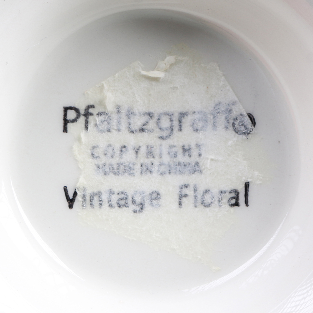 Four Ceramic Pitchers