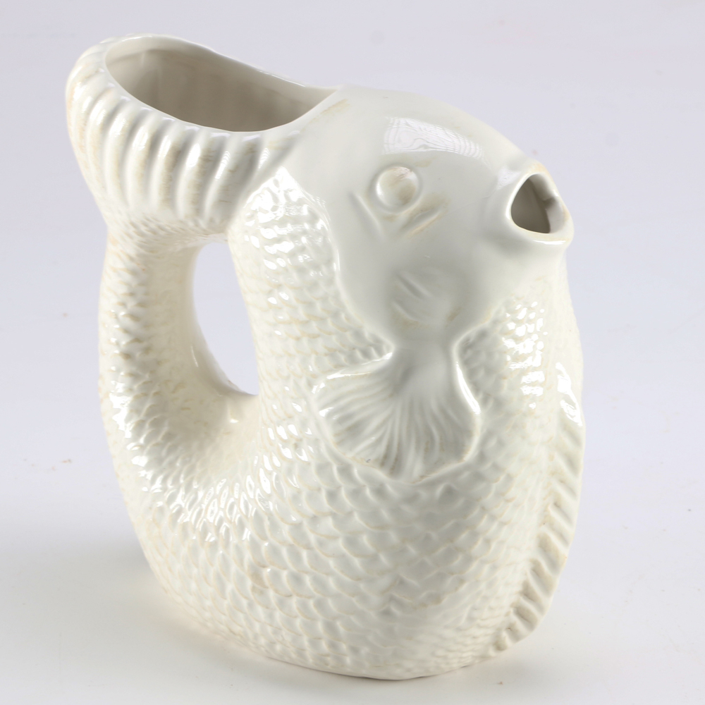 Four Ceramic Pitchers