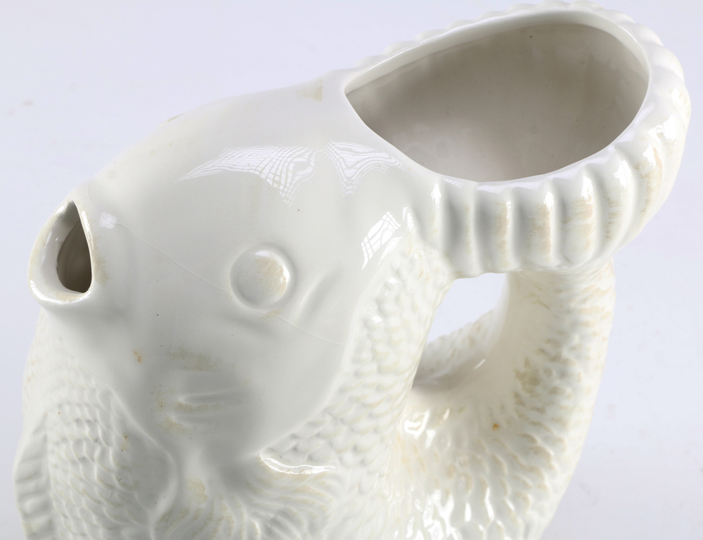 Four Ceramic Pitchers